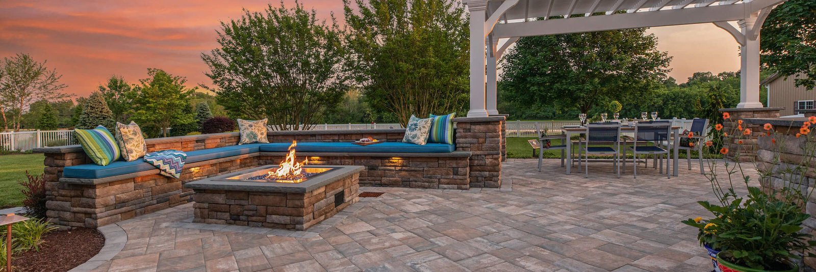 Paver installation around a fire pit offers a beautiful and sophisticated style to your yard.